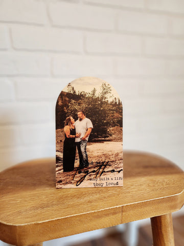 Boho style Arch wood cutout with custom printed photo directly to the wood with the phrase &quot;and so together they built a life they loved&quot; Includes photo stand to sit on desk.